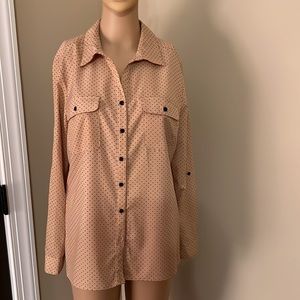 Women’s polyester/spandex button up, v-neck blouse.